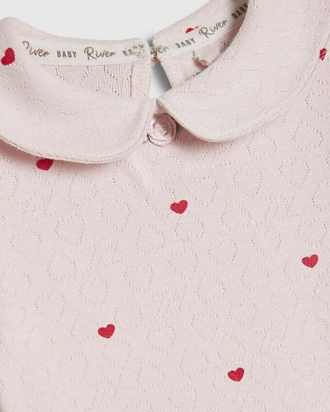 Rosa bodysuit med hjärtmönster för babyflickor