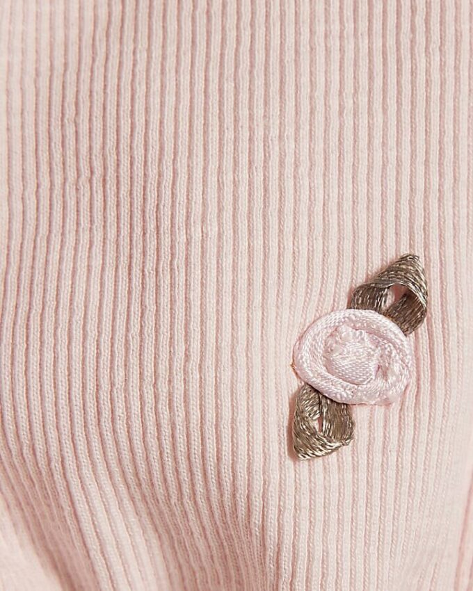 Rosa bodysuit och strumpor för babyflickor