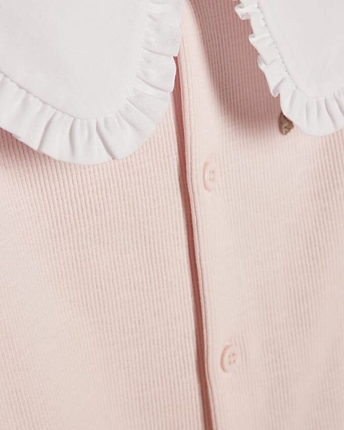 Rosa bodysuit och strumpor för babyflickor