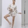 Rosa bouclé-shorts med blommönster