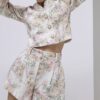 Rosa bouclé-shorts med blommönster