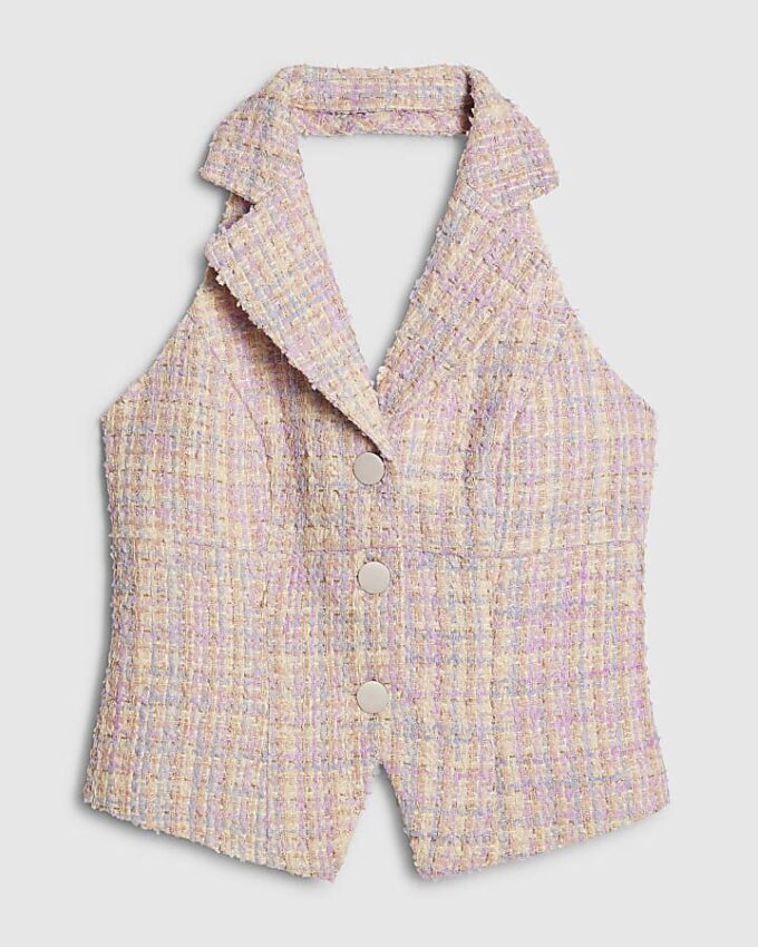 Rosa boucléväst med krage och halterneck