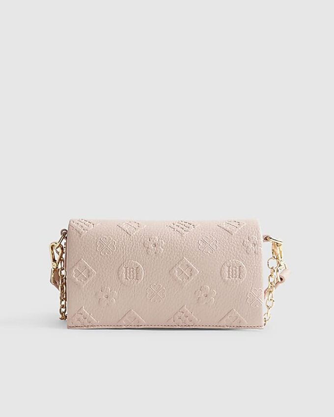 Rosa crossbody-väska med präglat monogram