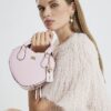 Rosa hjärtformad crossbody-väska