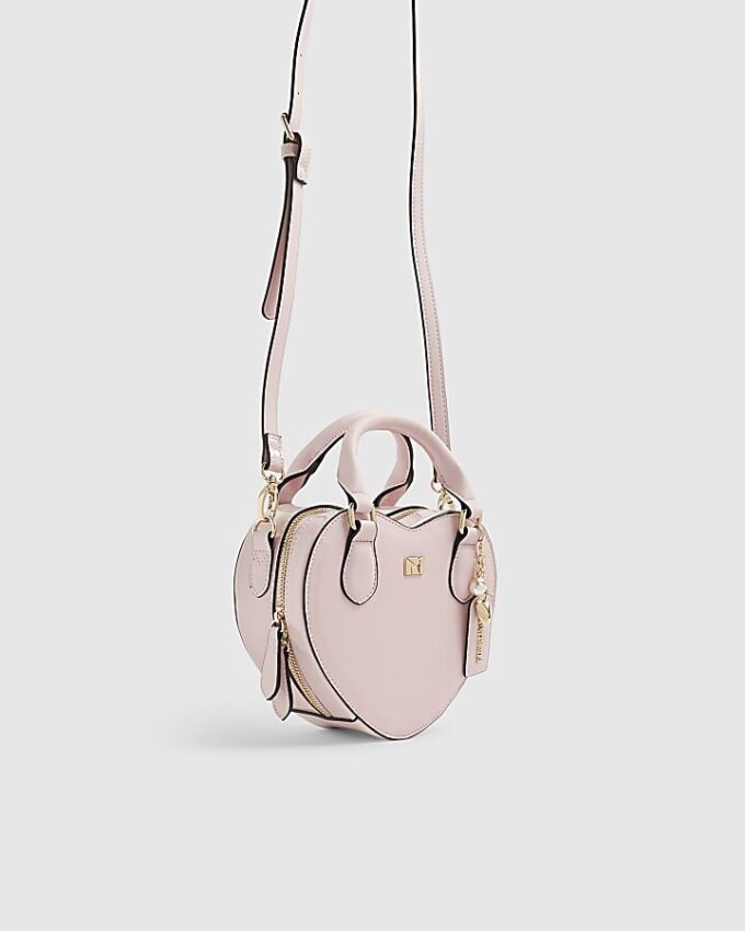 Rosa hjärtformad crossbody-väska