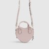 Rosa hjärtformad crossbody-väska