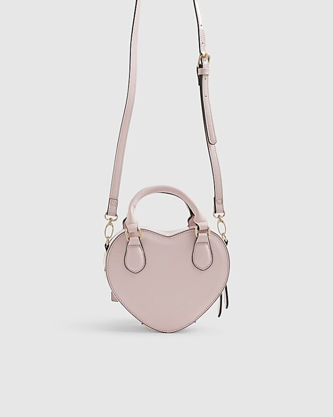 Rosa hjärtformad crossbody-väska