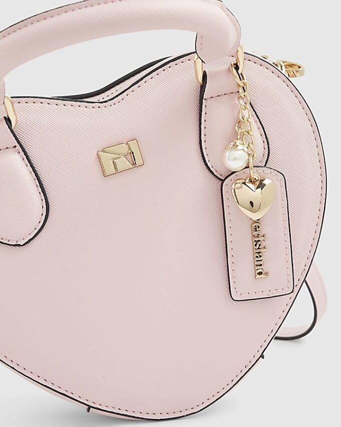Rosa hjärtformad crossbody-väska