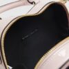 Rosa hjärtformad crossbody-väska