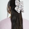 Rosa hårklämma med bouclé-rosett