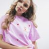 Rosa kortärmad T-shirt med broderat Ur Cute-tryck
