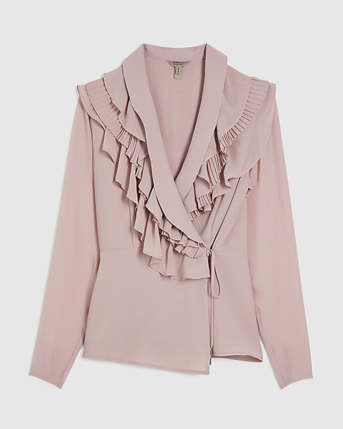 Rosa långärmad blus med volanger