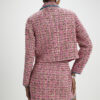 Rosa minikjol i bouclé med whipstitch