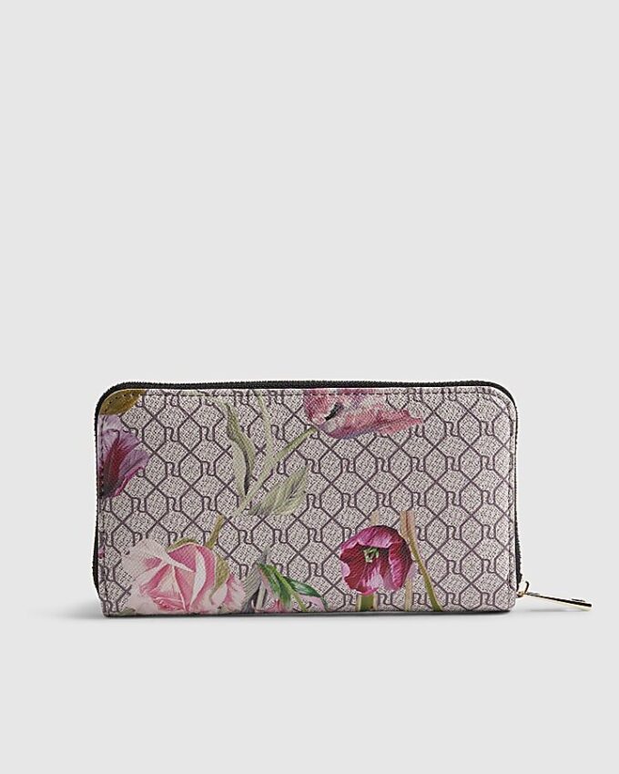 Rosa plånbok med monogram och blommönster på framsidan