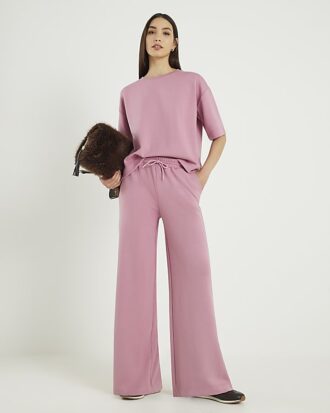 Rosa premiumjoggingbyxor med vida ben