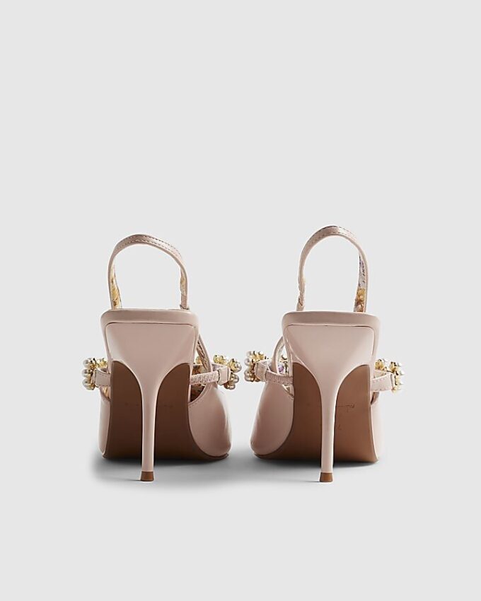 Rosa pumps med pärlblommor och rem bak