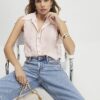 Rosa ärmlös blus med vågig kant
