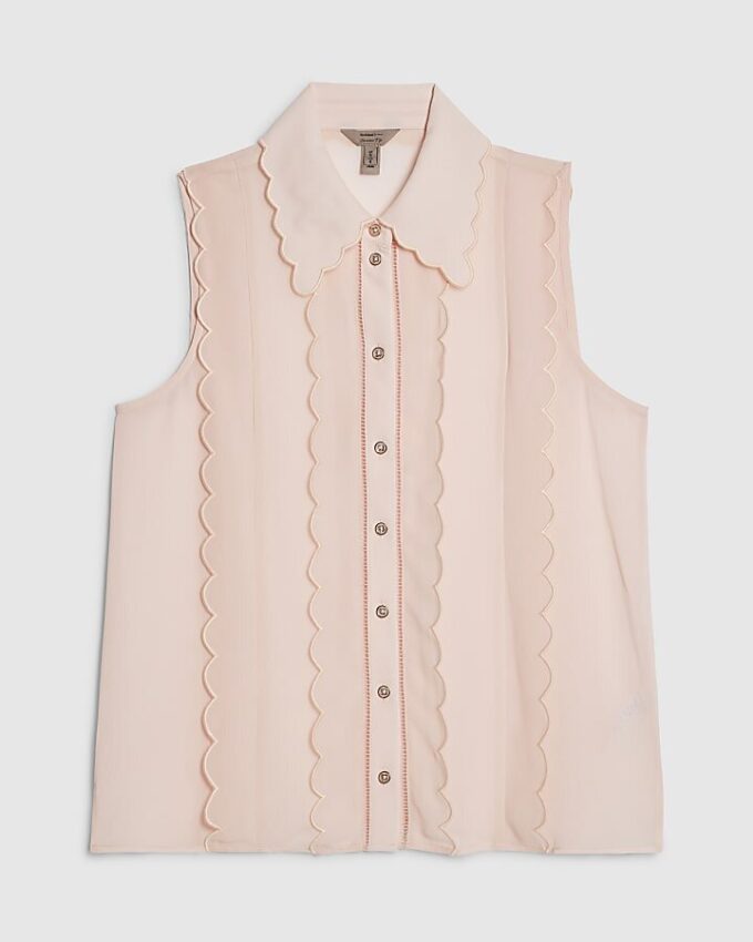 Rosa ärmlös blus med vågig kant