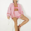 Rosa shorts med broderade blommor