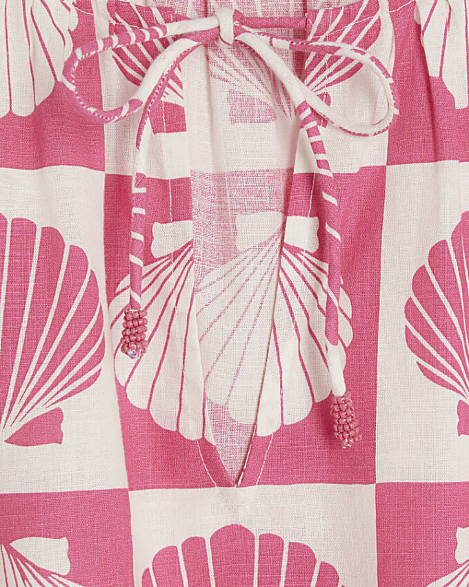 Rosa strandtop med snäcktryck