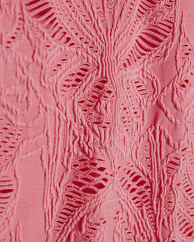 Rosa texturerad baddräkt med snäppknappar