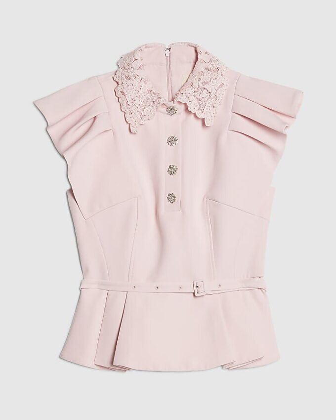 Rosa topp med volangärmar och strasspeplum