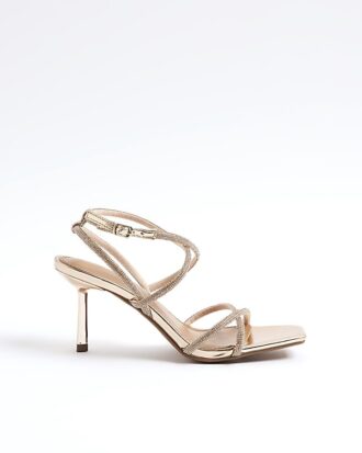 Roséguldiga sandaler med remmar och strass