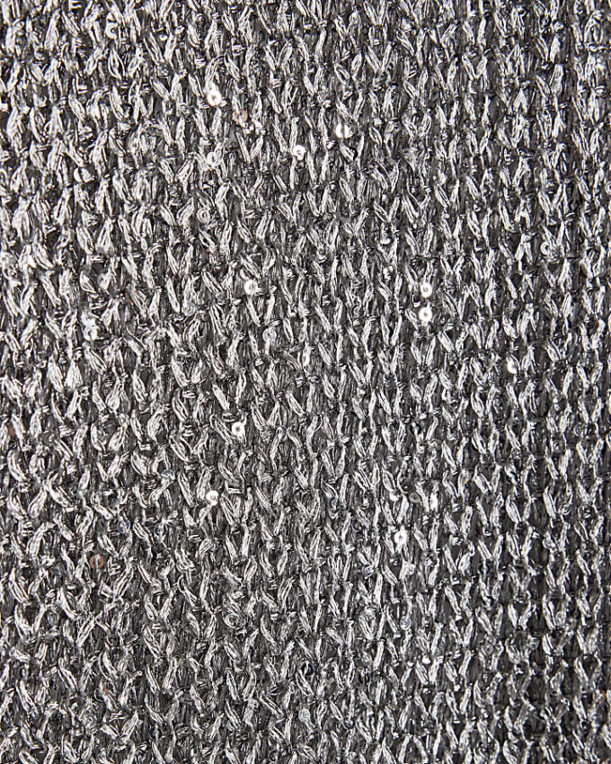 Silvermetalliska stickade byxor med vida ben