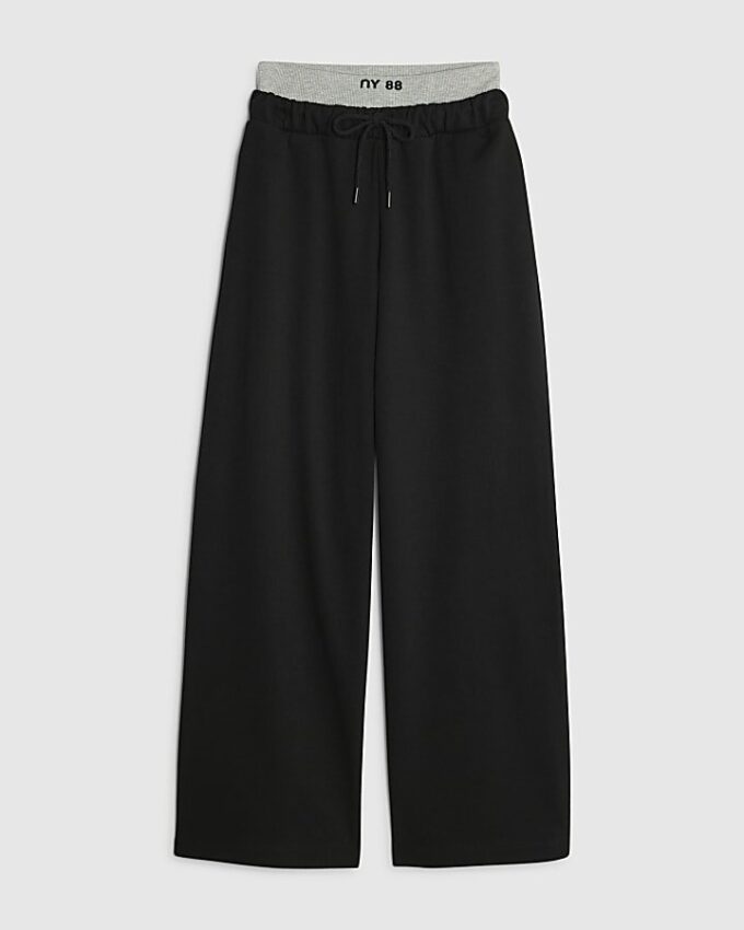 Svart 2-i-1 joggingbyxa med vida ben
