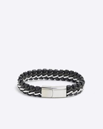 Svart armband i stål och tyg