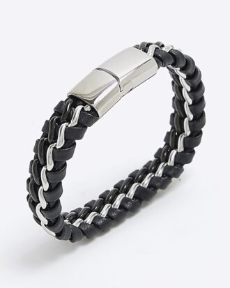 Svart armband i stål och tyg