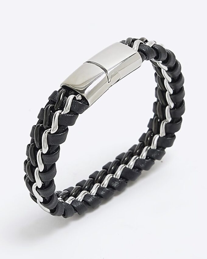 Svart armband i stål och tyg