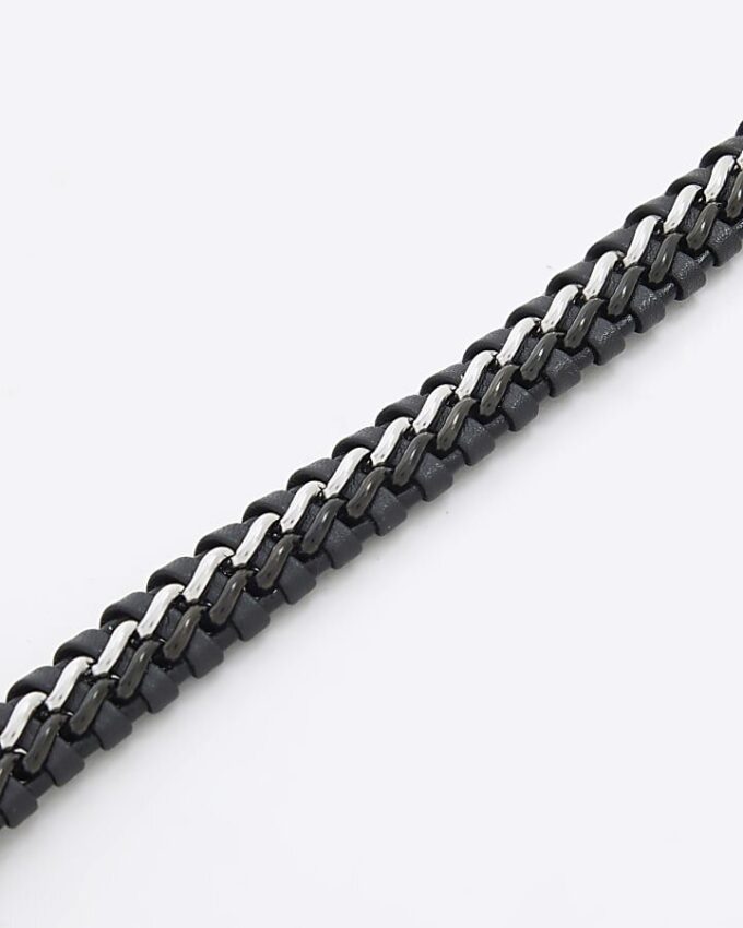 Svart armband i stål och tyg