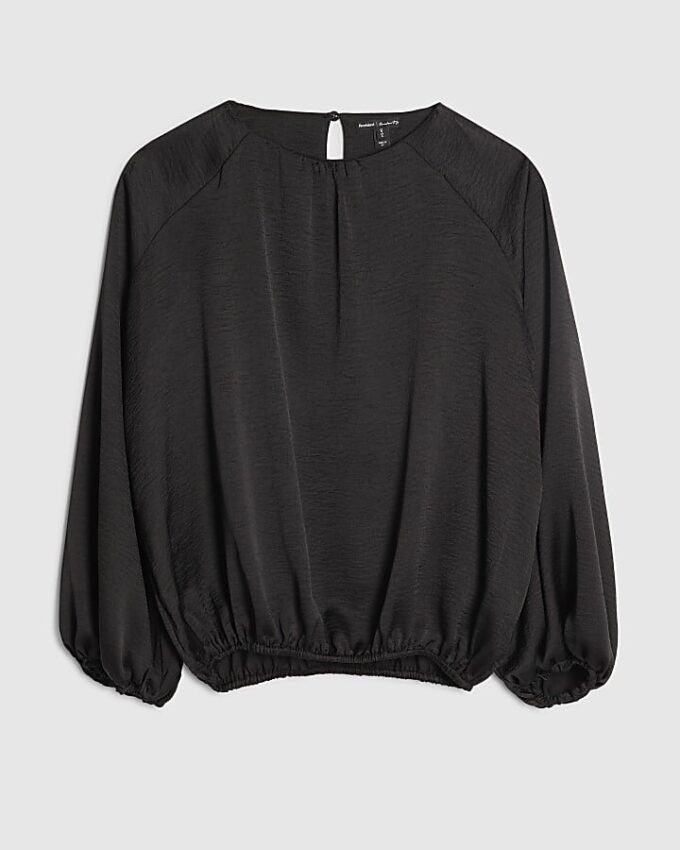 Svart blus med bubbelkant
