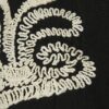 Svart broderad linne