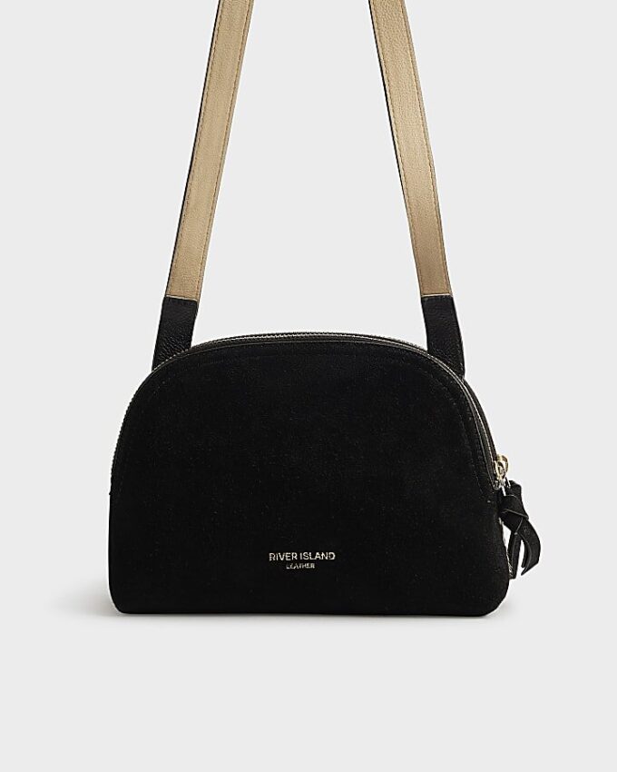 Svart crossbody-väska i ponnyhårsläder med zebramönster