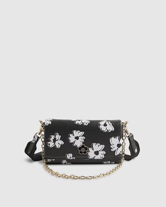 Svart crossbody-väska med daisy-tryck
