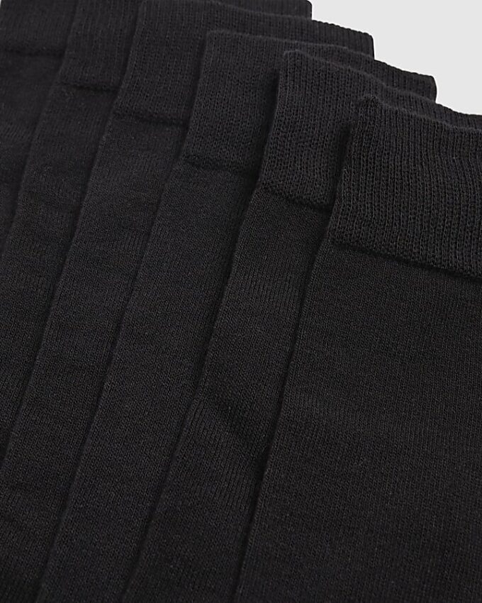 Svart enfärgat 7-pack strumpor