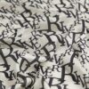 Svart halsduk med monogramtryck