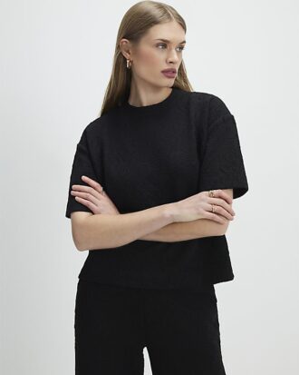 Svart jacquard-T-shirt med korta ärmar och boxig passform