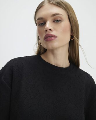 Svart jacquard-T-shirt med korta ärmar och boxig passform