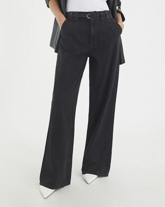 Svart jeans med hög midja, vida ben och knytning fram Svart jeans med hög midja, vida ben och knytning fram