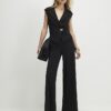 Svart jumpsuit med korta ärmar och vida ben