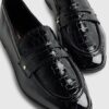 Svart lackloafers med skulpterad kant