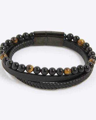 Svart läderarmband med tigeröga Svart läderarmband med tigeröga