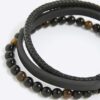 Svart läderarmband med tigeröga