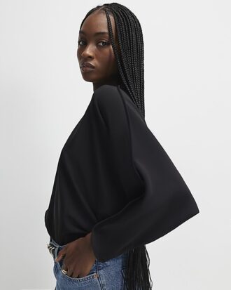 Svart långärmad batwing-top
