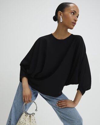 Svart långärmad batwing-top