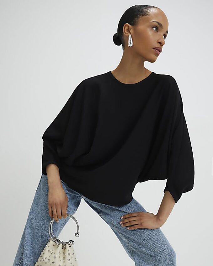 Svart långärmad batwing-top