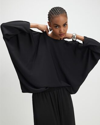 Svart långärmad batwing-top